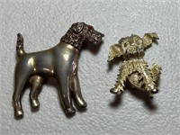 2 vintage dog brooches, left has rhinestones