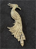 Vintage rhinestone bird brooch, silver tone with