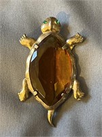 Vintage turtle brooch with large amber rhinestone