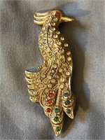 Vintage gold tone bird with red, white, green &