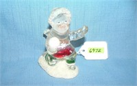 Colorized glass child figure with snowball