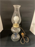 Electric lamp with chimney