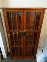 Wooden book case with glass doors, 9" x 26" x 47"