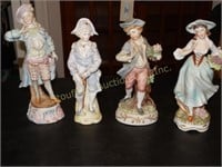 4 porcelain figurines, tallest 8", one shows wear