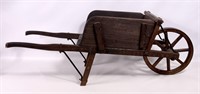 Child's wheelbarrow, 12" wooden wheel has