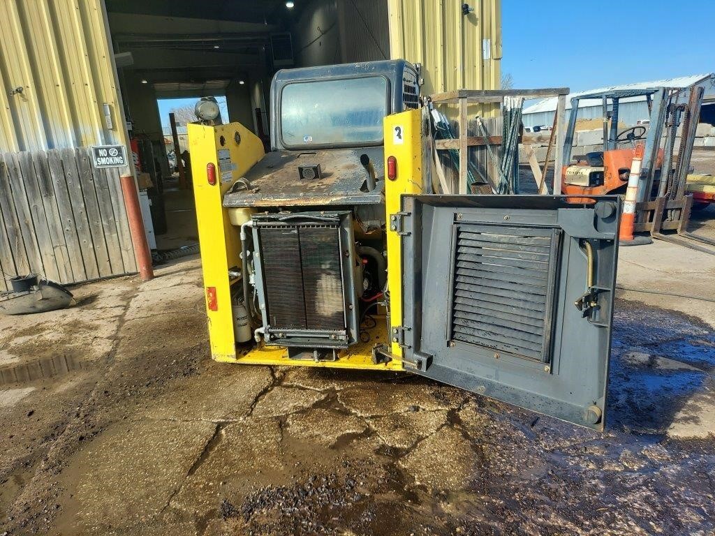 skid steer and bagging line auction
