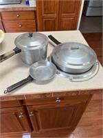 Miracle maid cookware , six piece pot and pan set