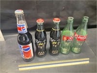 Pepsi and Coke bottles