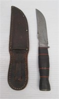 Antique 5" fixed blade hunting knife with sheath.