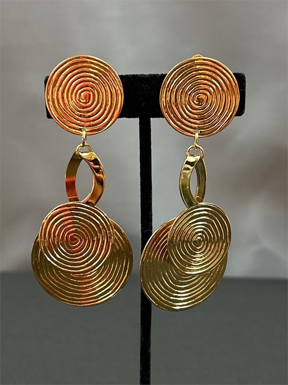 Goldtone dangling clip on earrings
