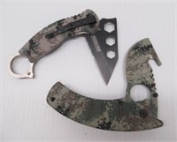 (2) Defender Extreme folding pocket knives.
