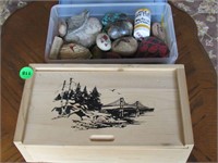 Wooden box and painted stones