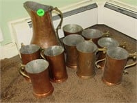 Copper looking mugs and pitcher
