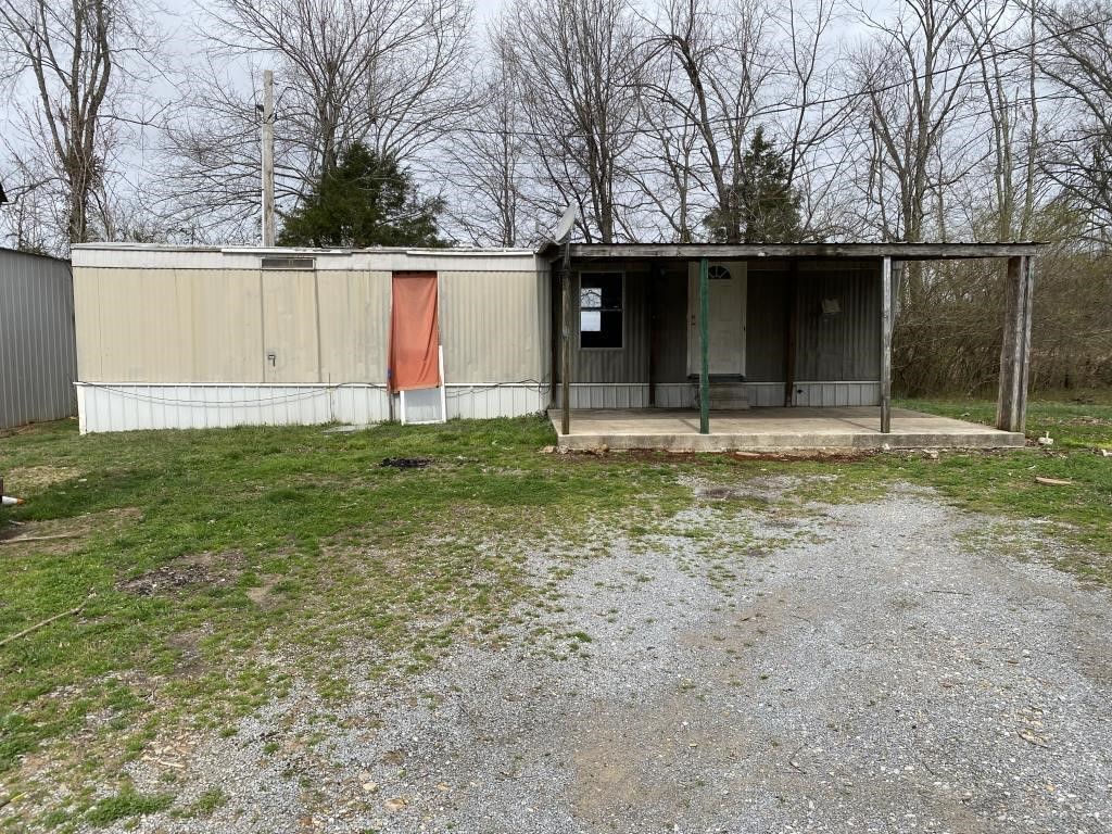 2 S/W Home & 2.84+-Acres • Shop Building