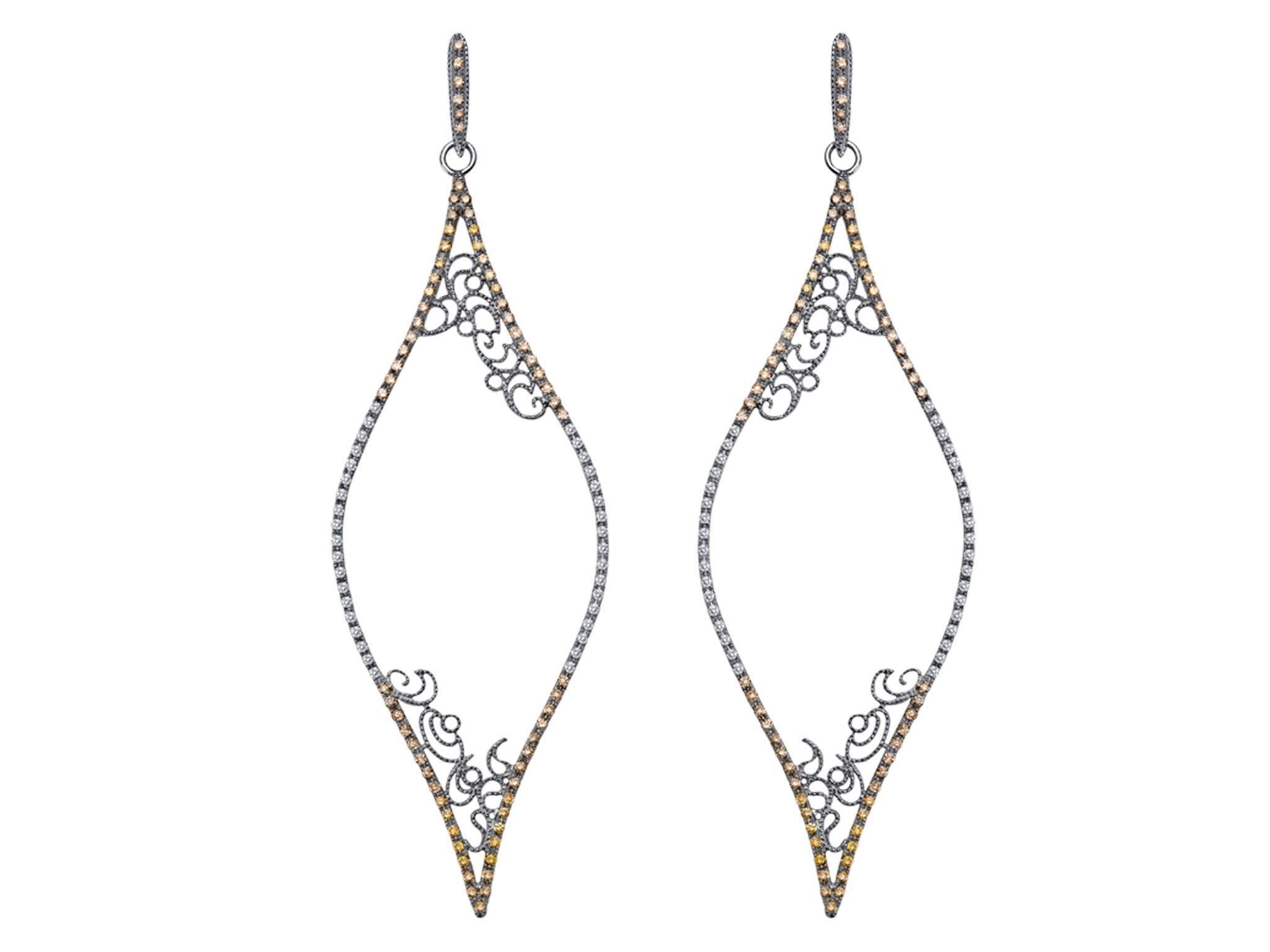 Delicate drop diamond earrings in assorted hues.