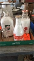 Box of misc dairy bottles and Benld dairy lids