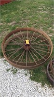 2 large iron wheels 46”