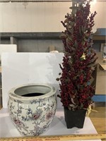 Large pot with artificial arrangement- has small