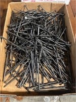 Flat of 5 inch pole nails
