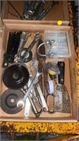 Wrenches, tape measure, metal scrapper, socket