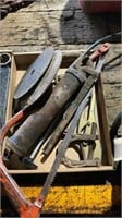 Grease gun, saw, horse shoe and grinding wheels