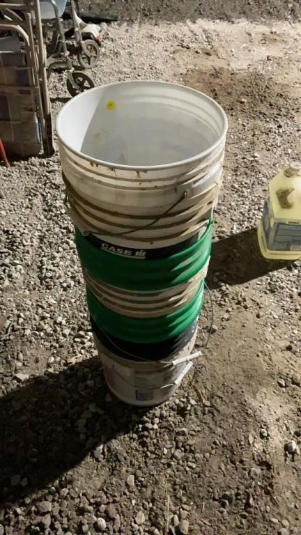 Seven 5 gallon buckets