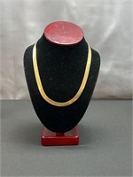 Gold tone herringbone necklace