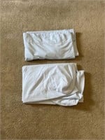 Contents of drawer, 2 sets of sheets