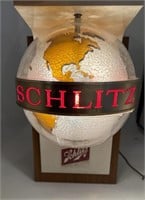 Schlitz Globe motion light. Couple cracks on