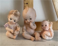 3 ceramic baby and kewpie figures