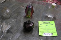 Group of four miniature perfume bottles