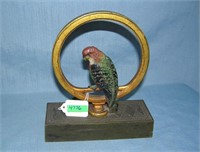 Hand painted cast iron parrot seated in ring door