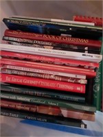 Lot of Christmas books and rugs