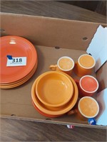 Lot  of orange/tangerine Fiestaware dishes