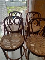 Set of 4 cane seat bottom bar stools, 30" tall