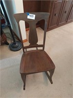 Vintage wooden armless rocking chair