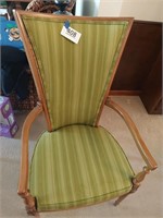 Green upholstered captain's chair