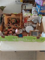 Lot of toy kitchen dishes and blocks