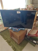 Insignia TV, flat screen, 42" with remote, model