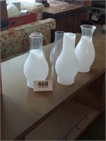 Lot of 5 oil lamp chimneys, 9" and 10" tall