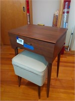 Singer sewing machine in cabinet and