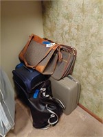 Lot of assorted suitcases