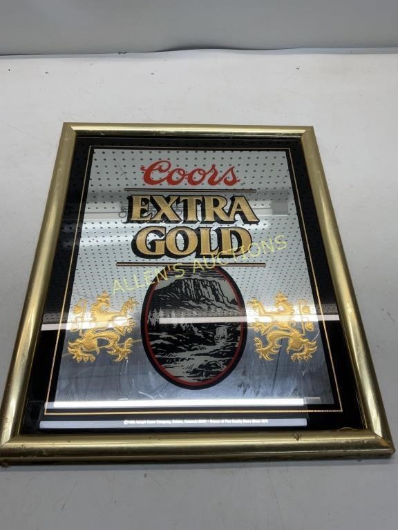 FRAMED COORS MIRROR