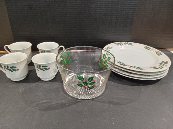 Four Porcelain Christmas Plates with Matching Cups