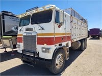 1985 Freightliner w/ 7.5 x 20 ft silage box
