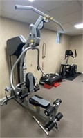 HOME GYM W/ ATTACHMENTS. TESTED AND WORKING
