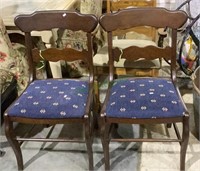 Matching pair of solid wood chairs with eight