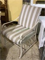 Outdoor patio armchair with padded seat and