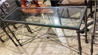 Wrought iron sofa/side table with glass table