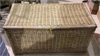 Vintage rattan blanket chest with hinged lid